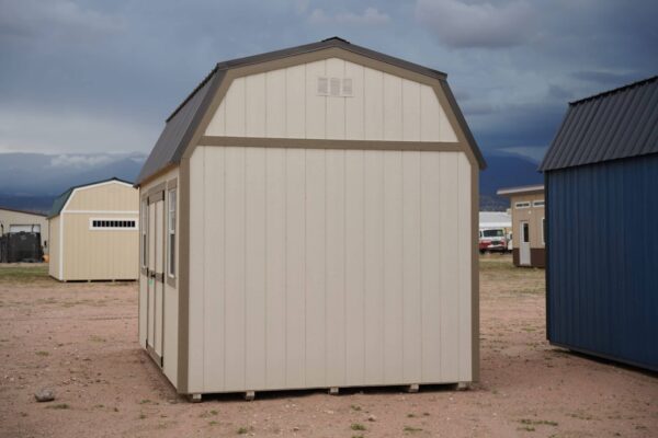 10x16 Barn Style storage shed with double doors and two windows viewed from the side.