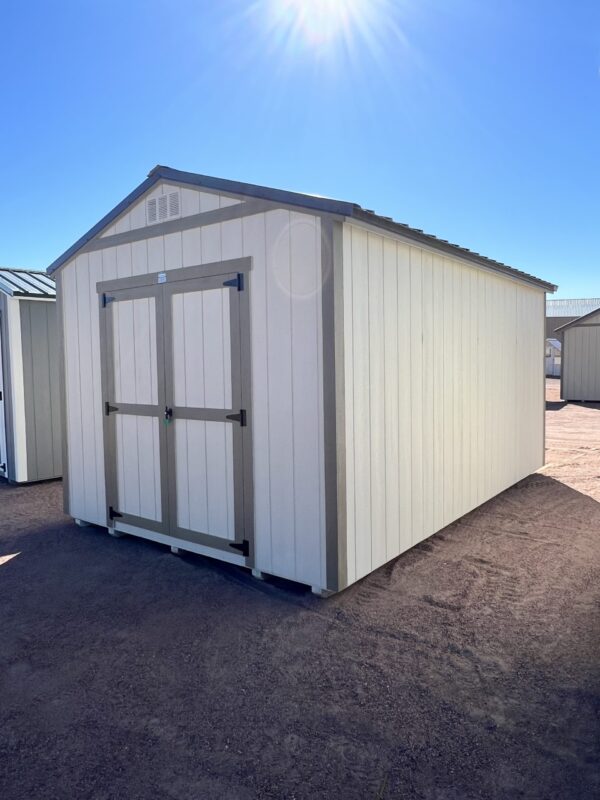 Right front corner perspective of the 10x16 Gable Style storage shed, highlighting its tan wooden walls.